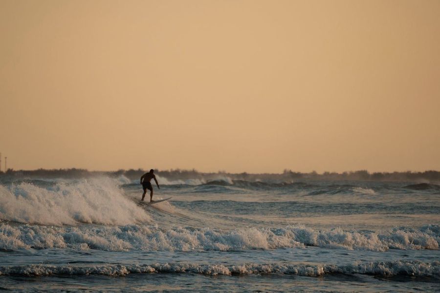 Surfing at Tannirbhavi Beach