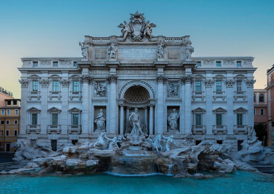Throwing a Coin into the Trevi Fountain